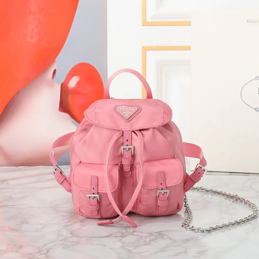 P Family New Mini Crossbody Backpack with ECONYL® Regenerated Nylon and Saffiano Leather