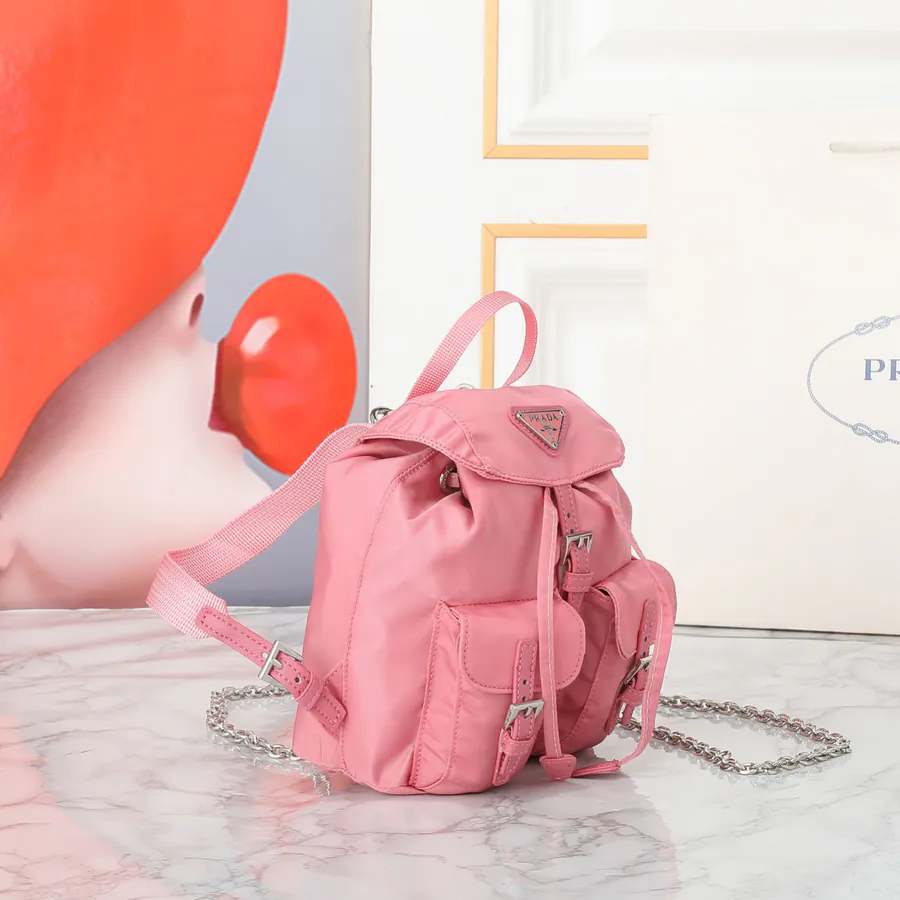P Family New Mini Crossbody Backpack with ECONYL® Regenerated Nylon and Saffiano Leather