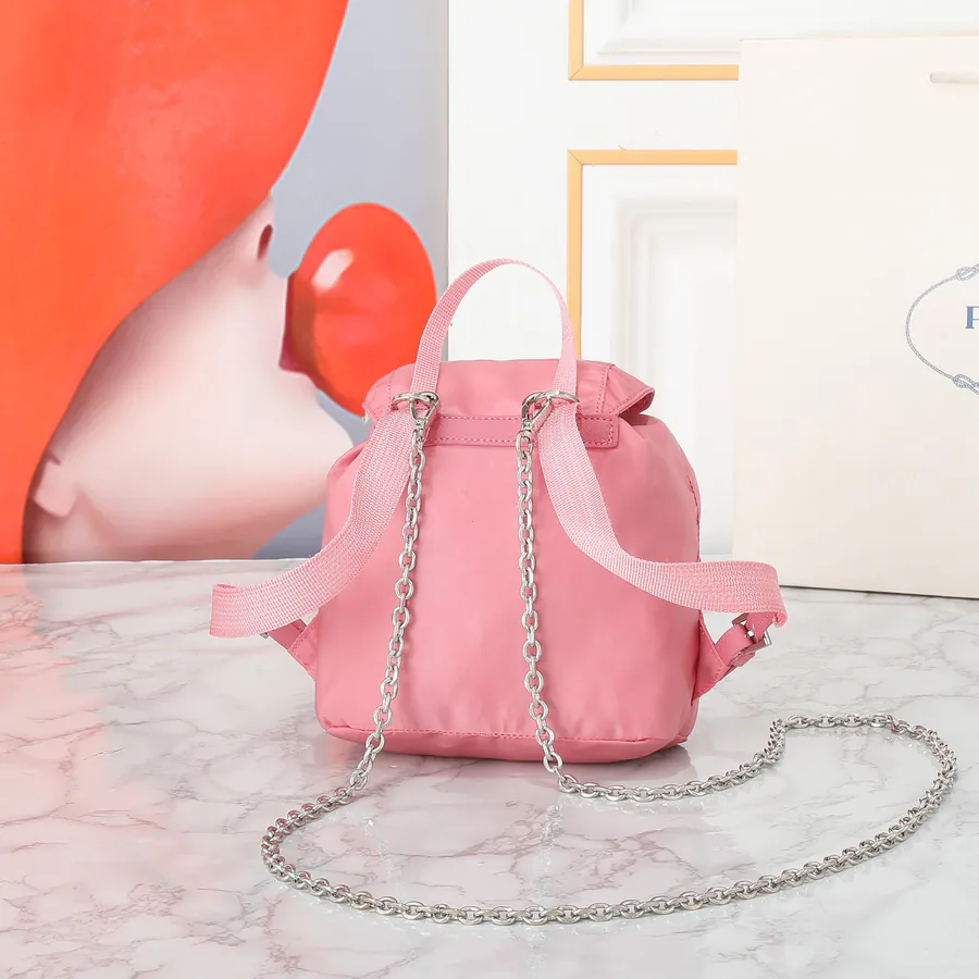 P Family New Mini Crossbody Backpack with ECONYL® Regenerated Nylon and Saffiano Leather