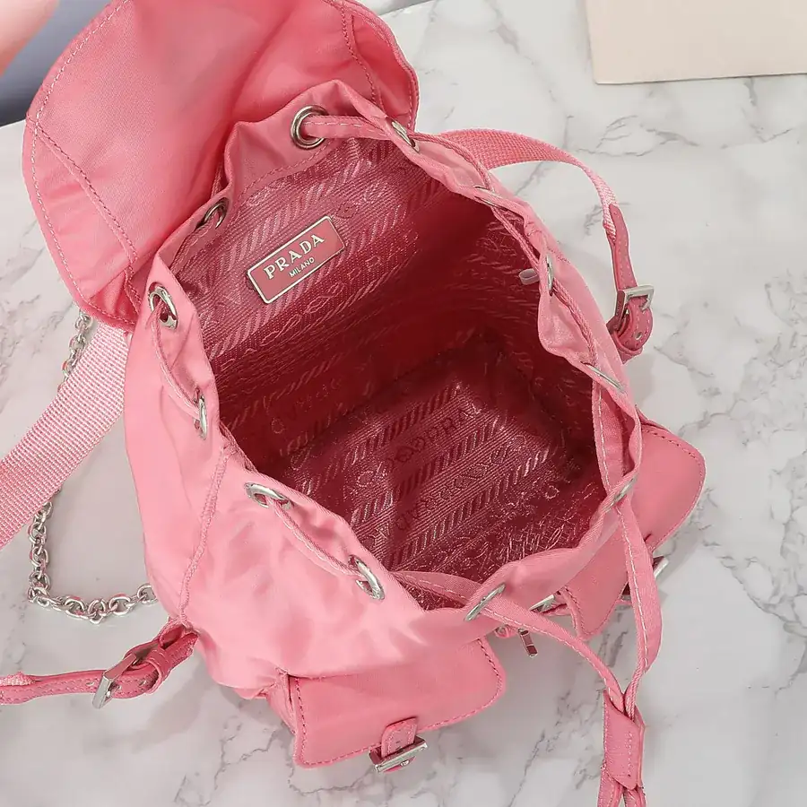 P Family New Mini Crossbody Backpack with ECONYL® Regenerated Nylon and Saffiano Leather