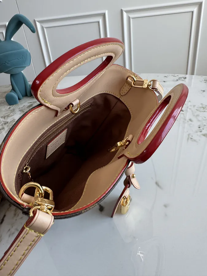 Rivage BB Bucket Bag by Nicolas Ghesquiere
