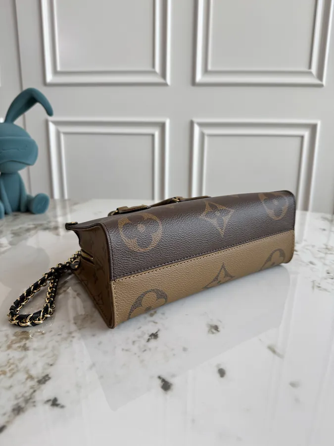 OnTheGo East West Handbag with Monogram Giant Elements