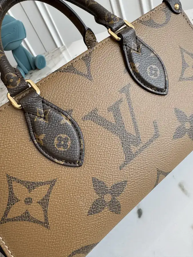 OnTheGo East West Handbag with Monogram Giant Elements