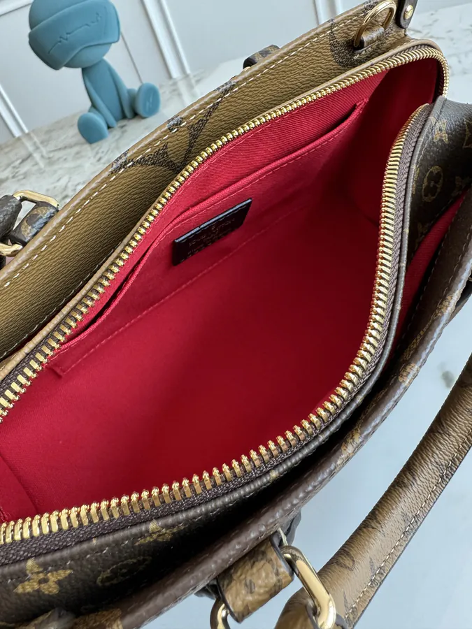 OnTheGo East West Handbag with Monogram Giant Elements