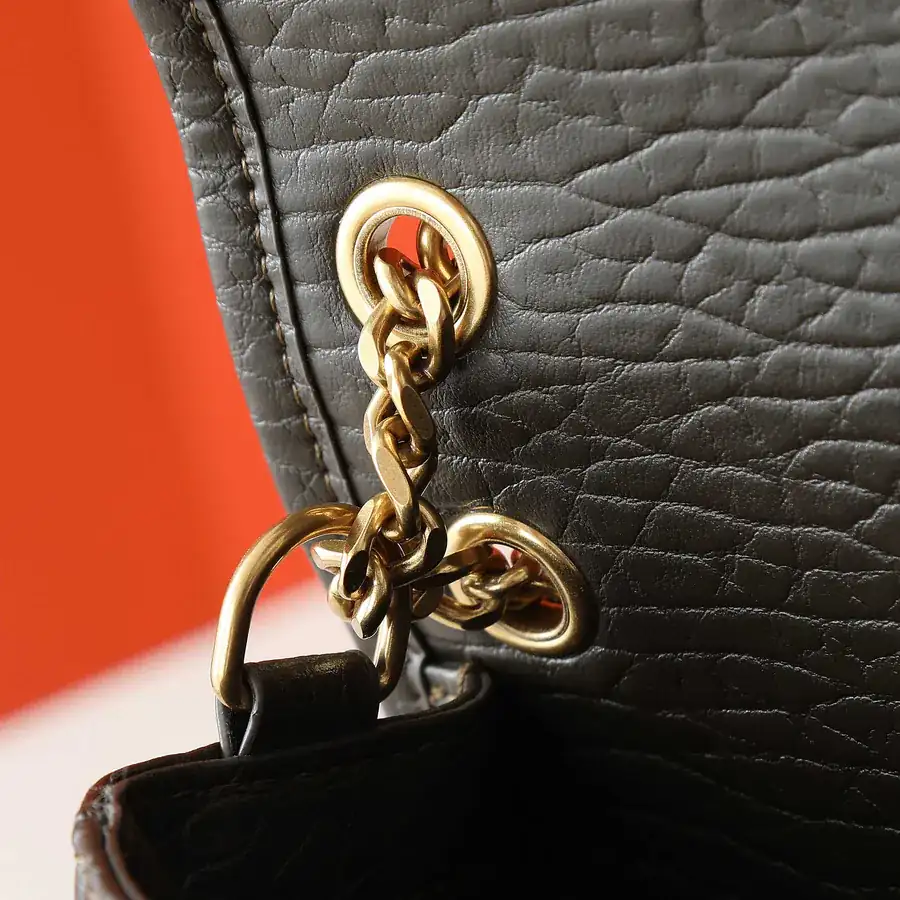 New NIKAI Mini Front Flap Handbag with Grained Calfskin