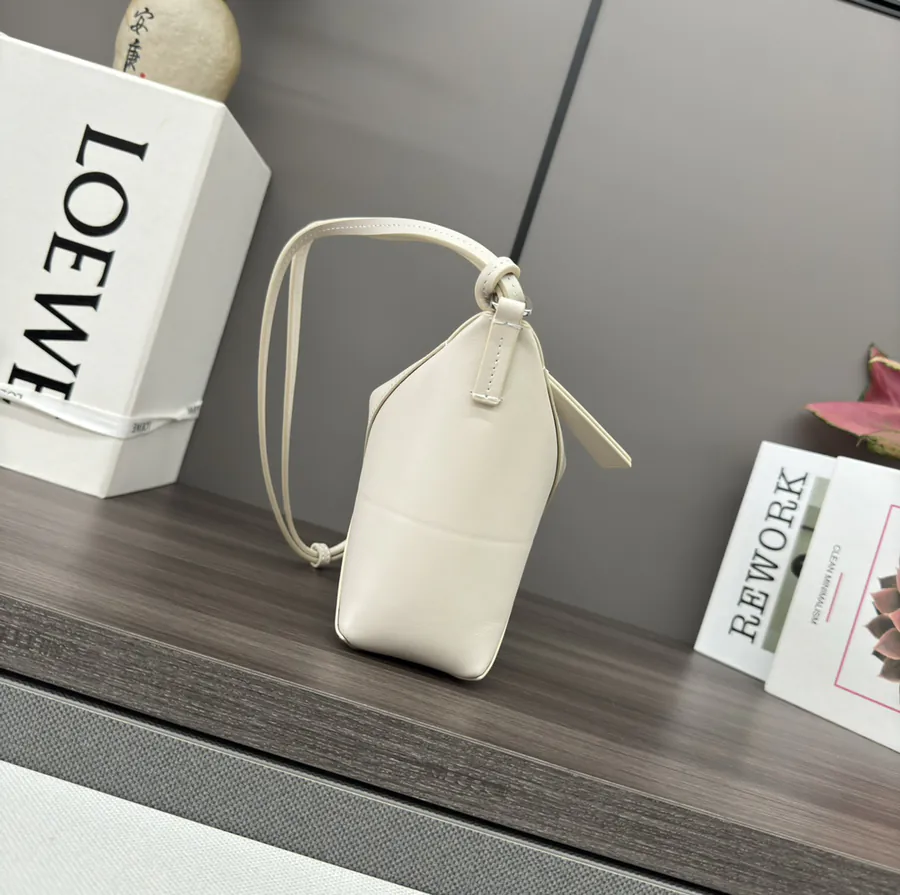 Lewell Puzzle Fold Pouch A Reimagined Practical Handbag