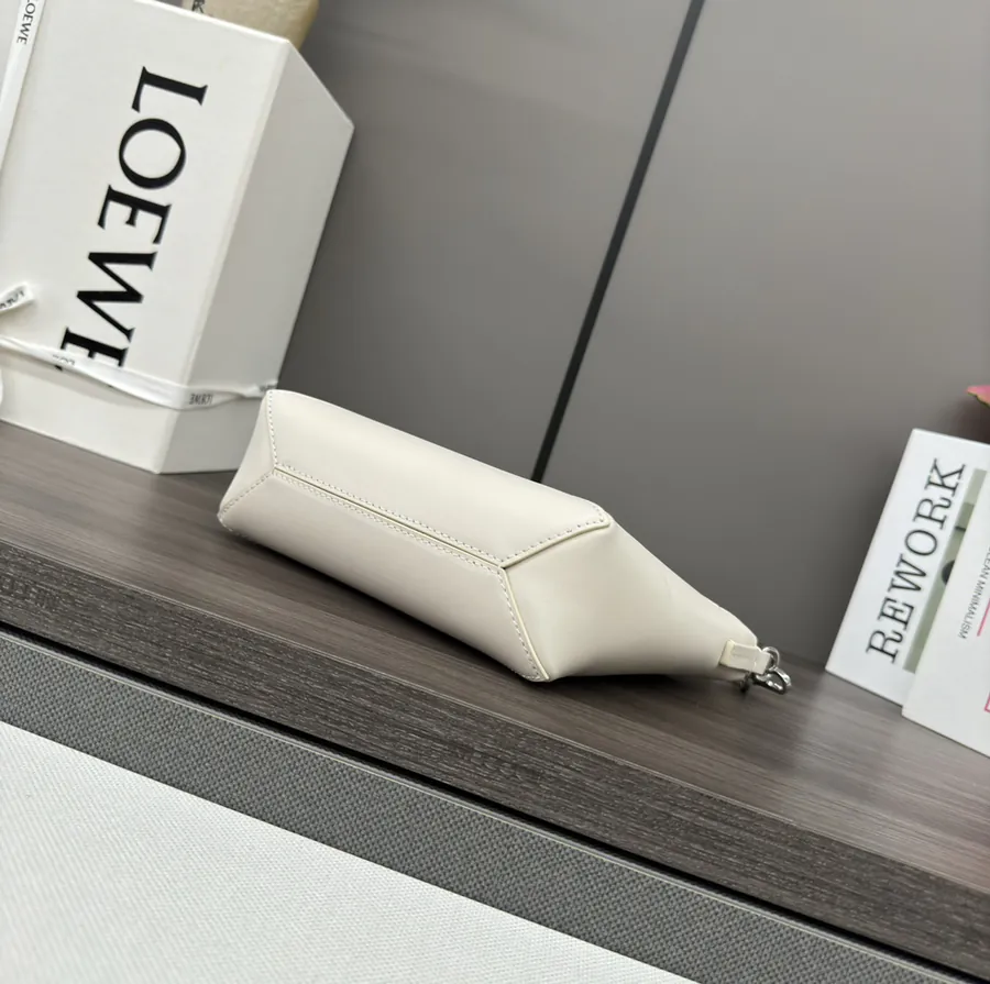 Lewell Puzzle Fold Pouch A Reimagined Practical Handbag
