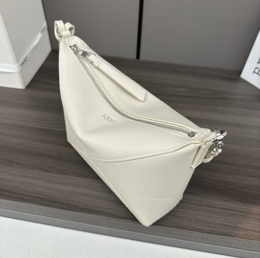 Lewell Puzzle Fold Pouch A Reimagined Practical Handbag