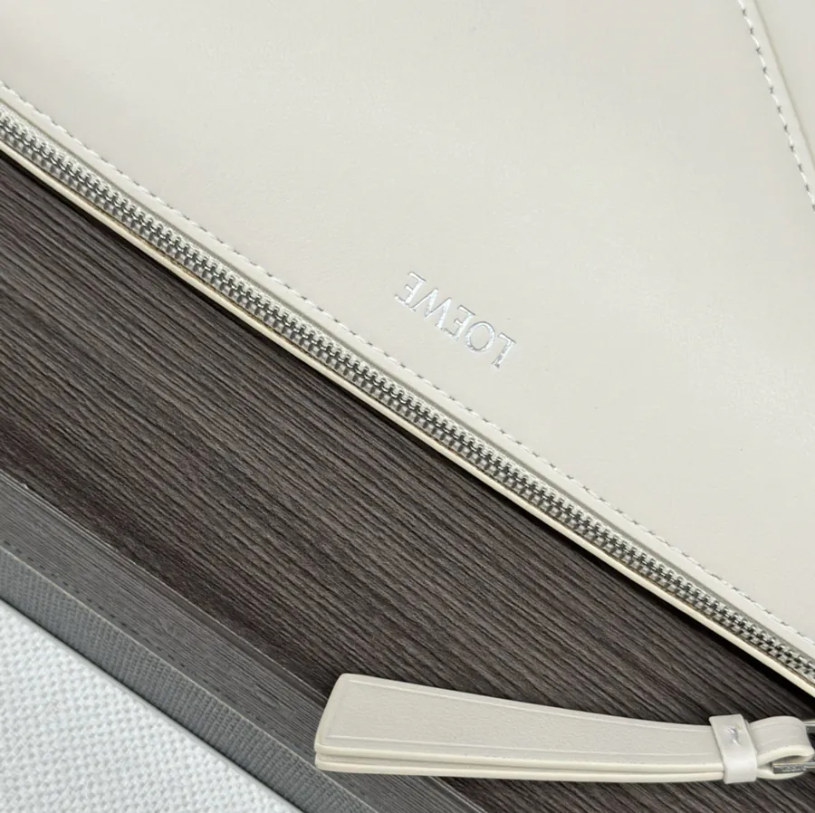 Lewell Puzzle Fold Pouch A Reimagined Practical Handbag