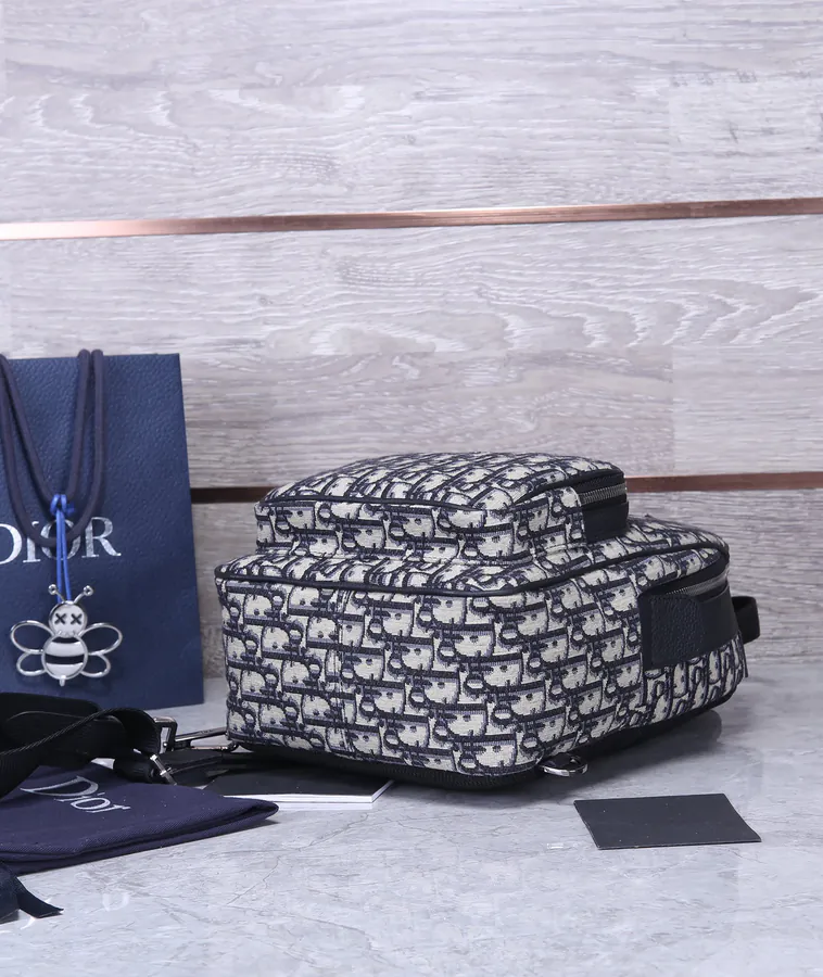 Rider Inspired Oblique Print Crossbody Backpack
