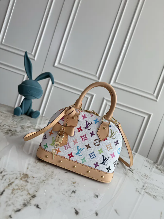 Alma BB Handbag with Grained Calfskin and Monogram Canvas
