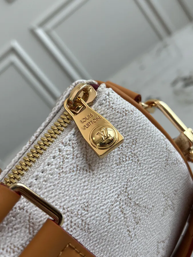 KEEALL BANDOULIÈRE 25 Handbag in Semi Handmade Material