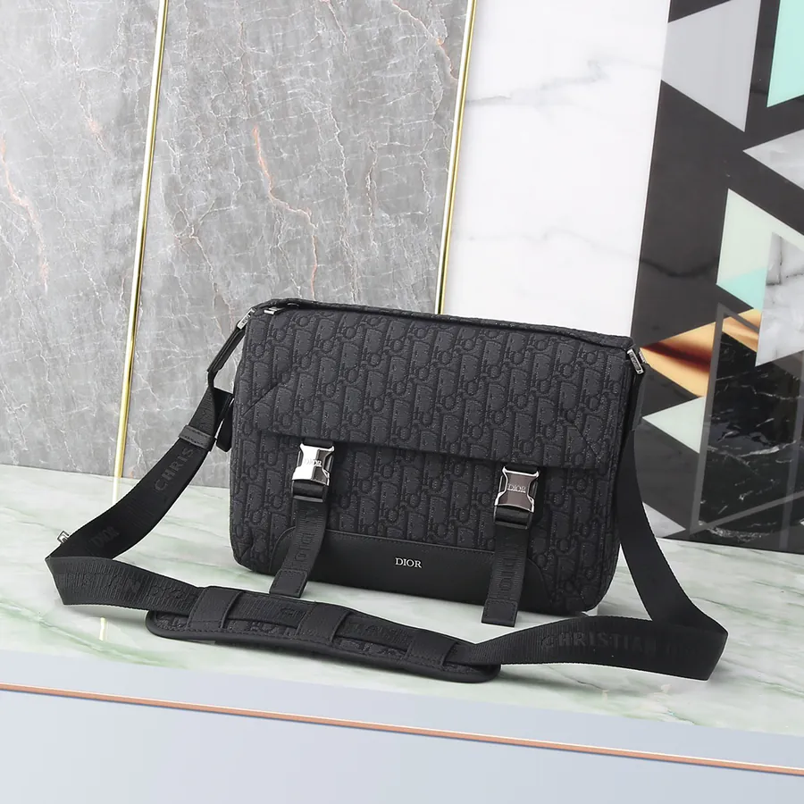 Explorer Handbag with Classic Messenger Style, Grained Calfskin and Oblique Print