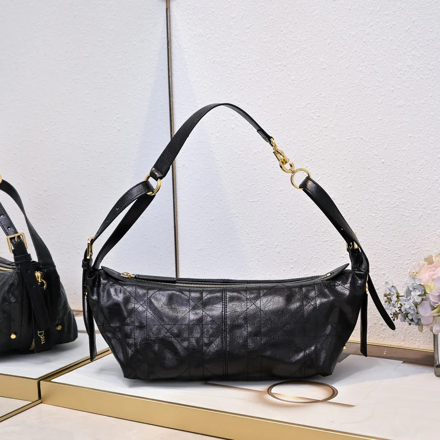 D Journey Bucket Bag Large, Black Calfskin, Cistian Paris Logo