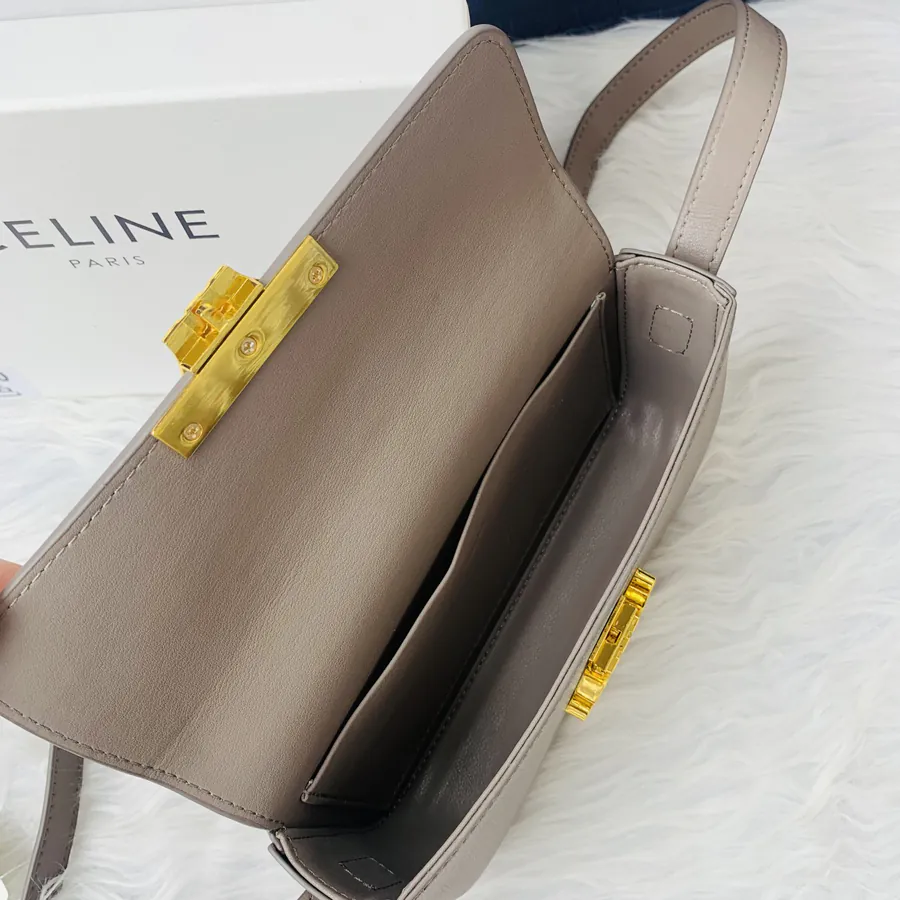 TRIOMPHE Leather Shoulder Bag