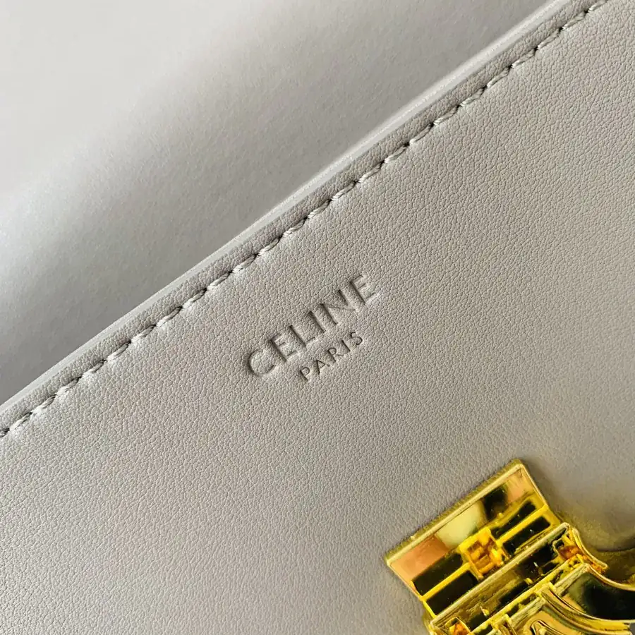 TRIOMPHE Leather Shoulder Bag