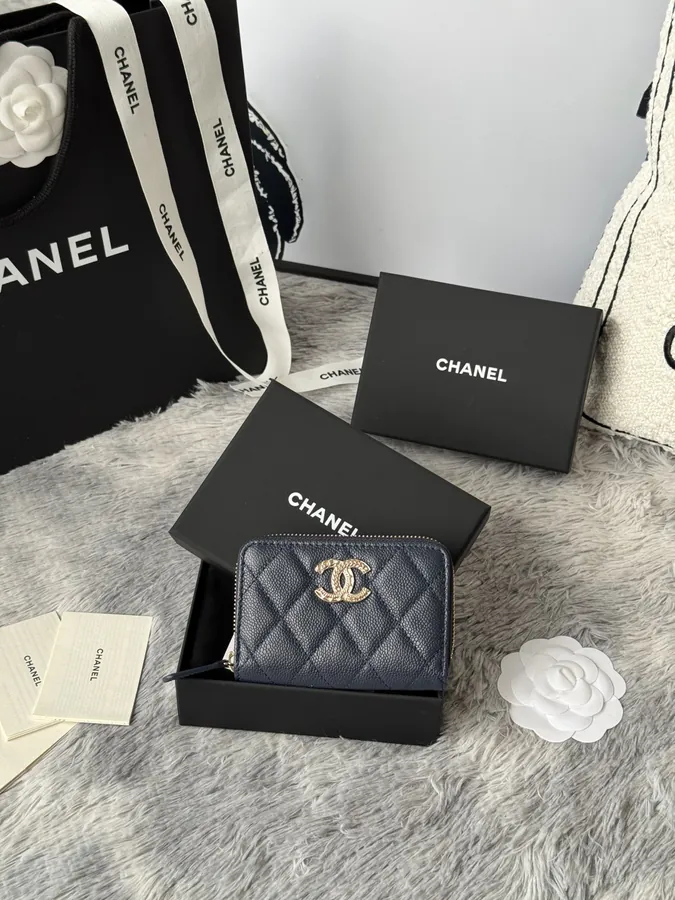 CHANEL 22k Embossed Logo Large Bucket Bag