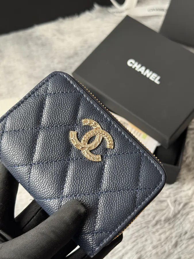 CHANEL 22k Embossed Logo Large Bucket Bag