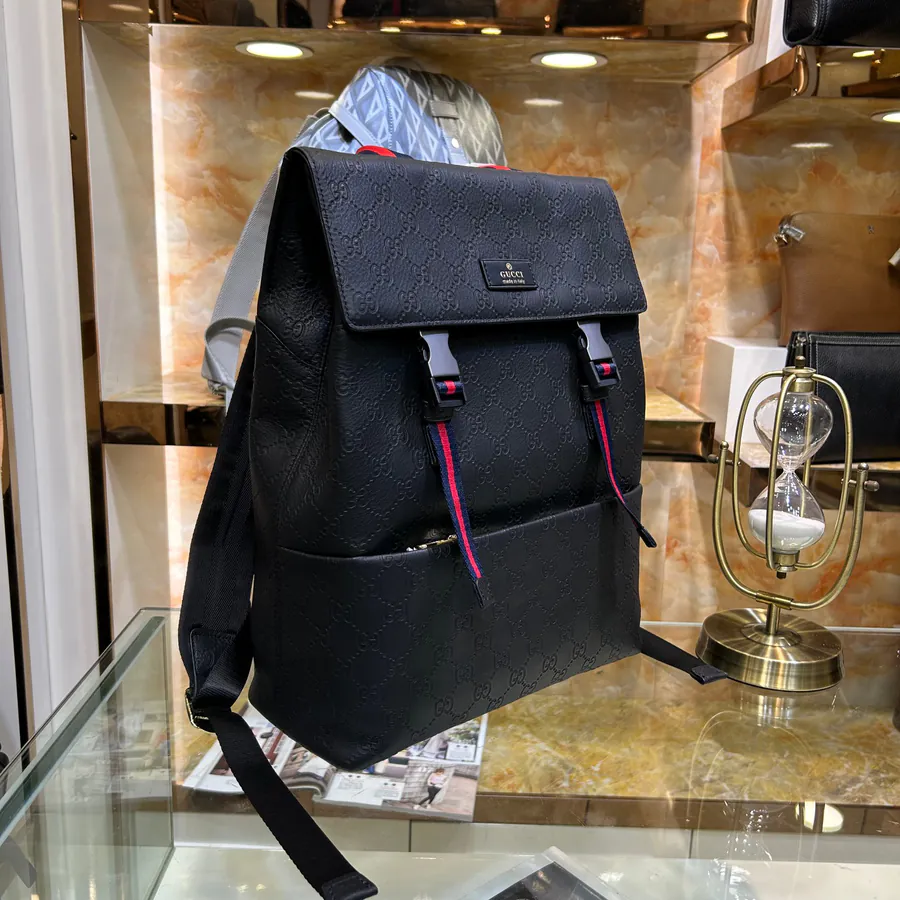 Gucci Classic Canvas Backpack with Embossed Design