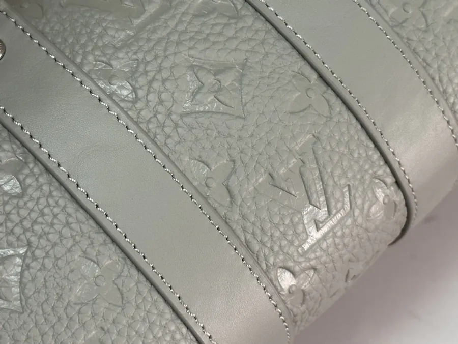 Taurillon Monogram Mini Bucket Bag Urban Elegance