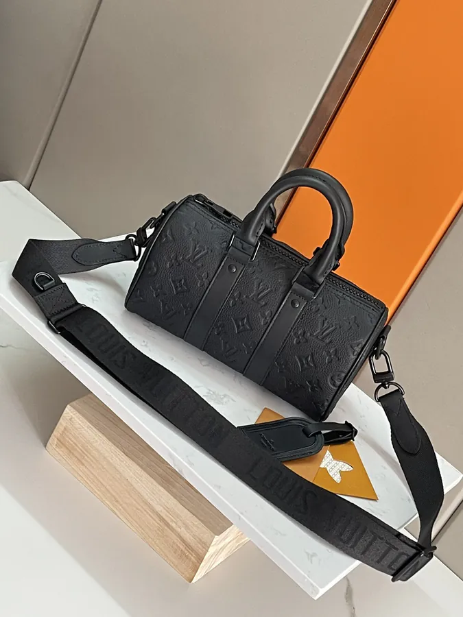Taurillon Monogram Mini Bag Classic Design with Leather Trim