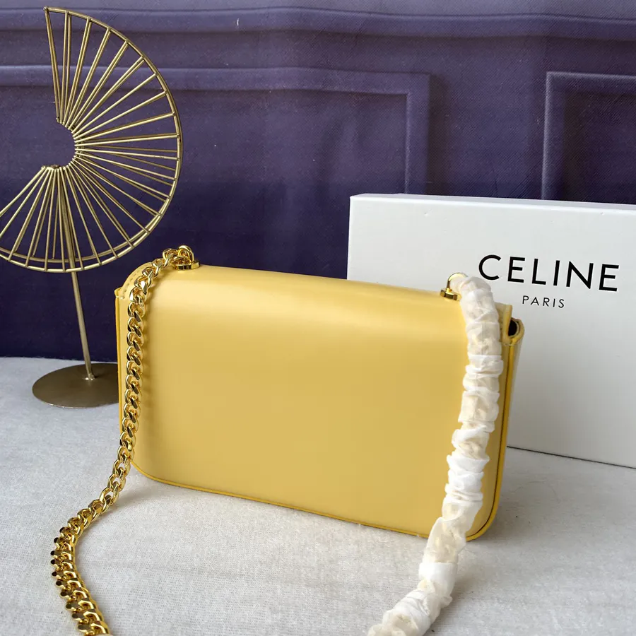 TRIOMPHE Yellow Bucket Bag