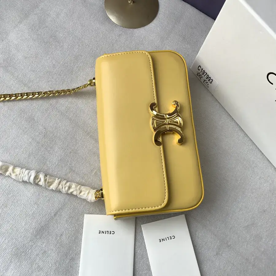 TRIOMPHE Yellow Bucket Bag