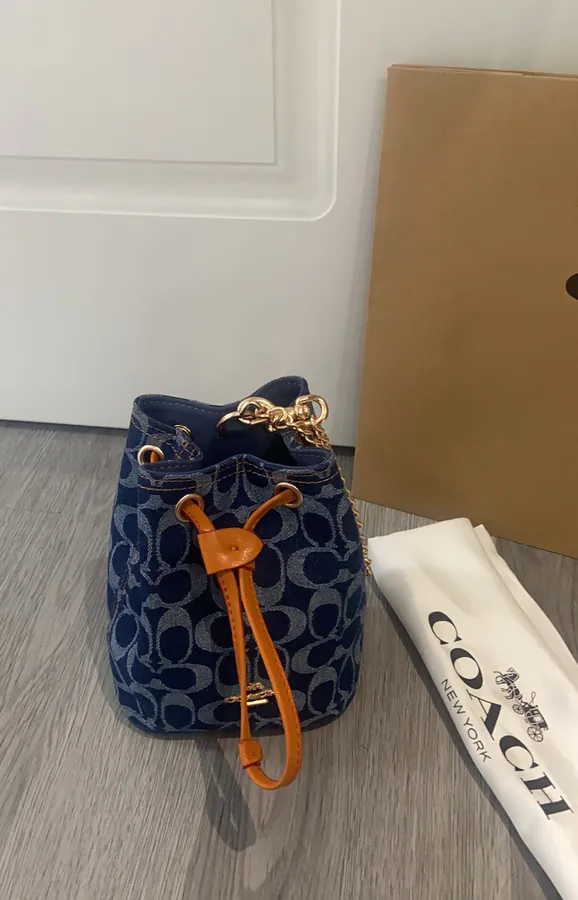 2025 New Drawstring Mini Bucket Bag in Denim Grained Calfskin