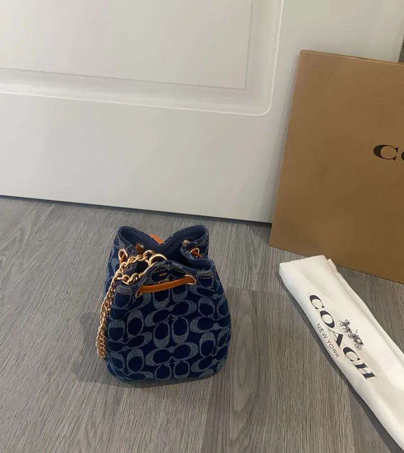 2025 New Drawstring Mini Bucket Bag in Denim Grained Calfskin