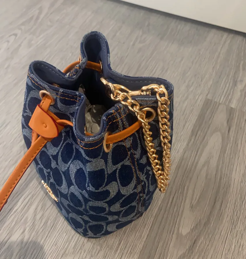 2025 New Drawstring Mini Bucket Bag in Denim Grained Calfskin