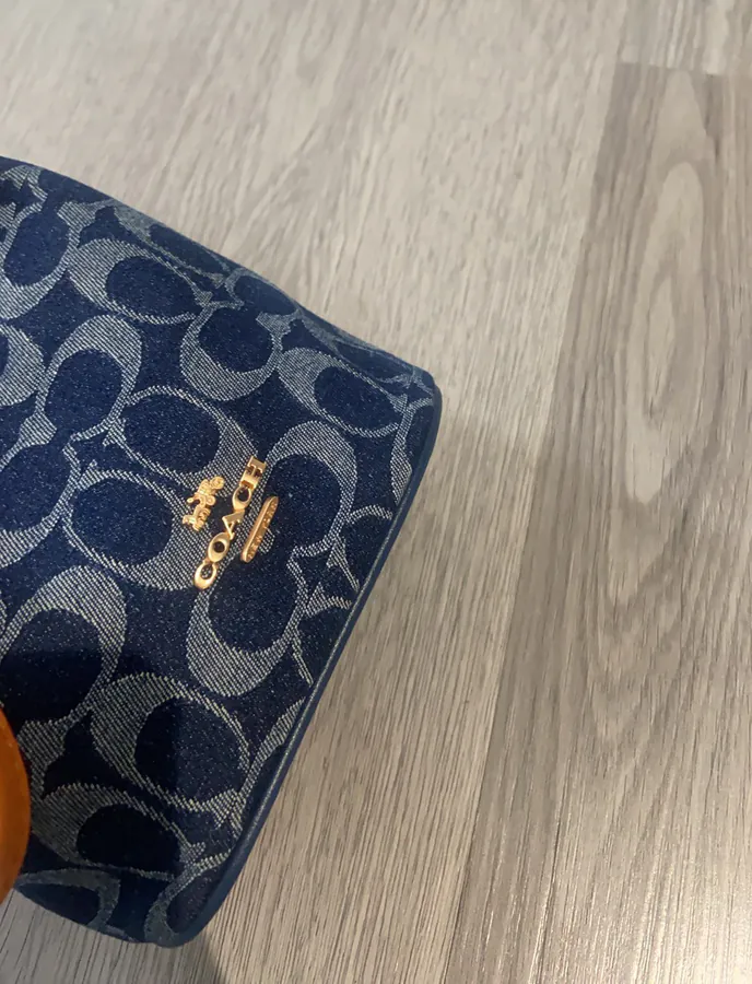 2025 New Drawstring Mini Bucket Bag in Denim Grained Calfskin