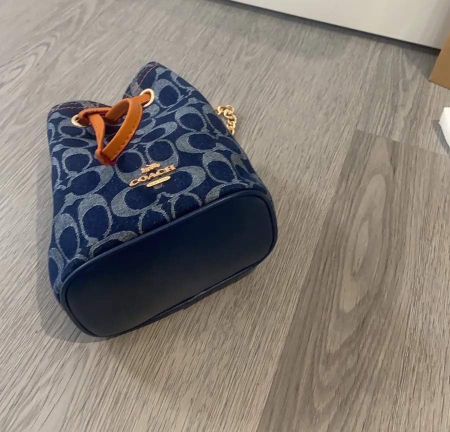 2025 New Drawstring Mini Bucket Bag in Denim Grained Calfskin