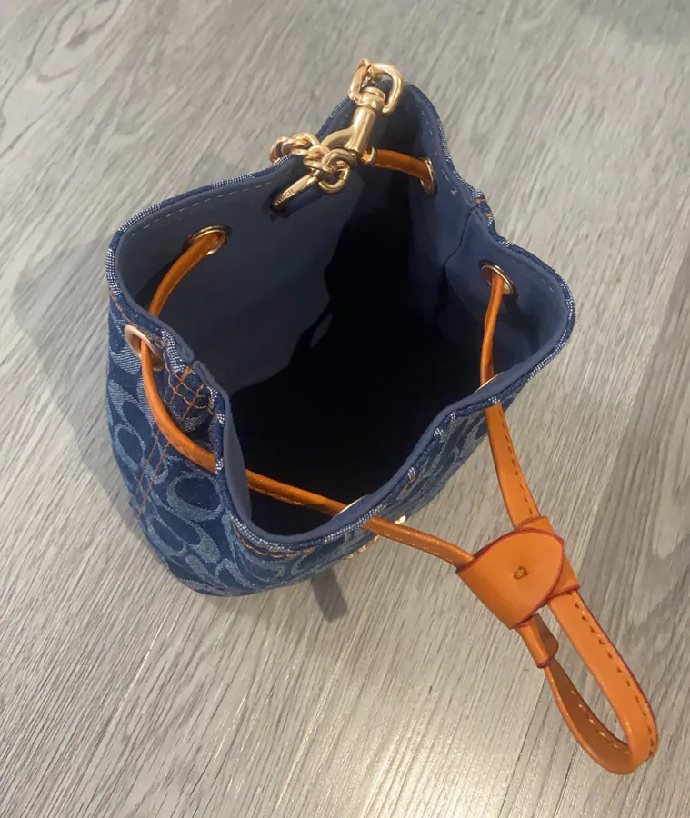 2025 New Drawstring Mini Bucket Bag in Denim Grained Calfskin