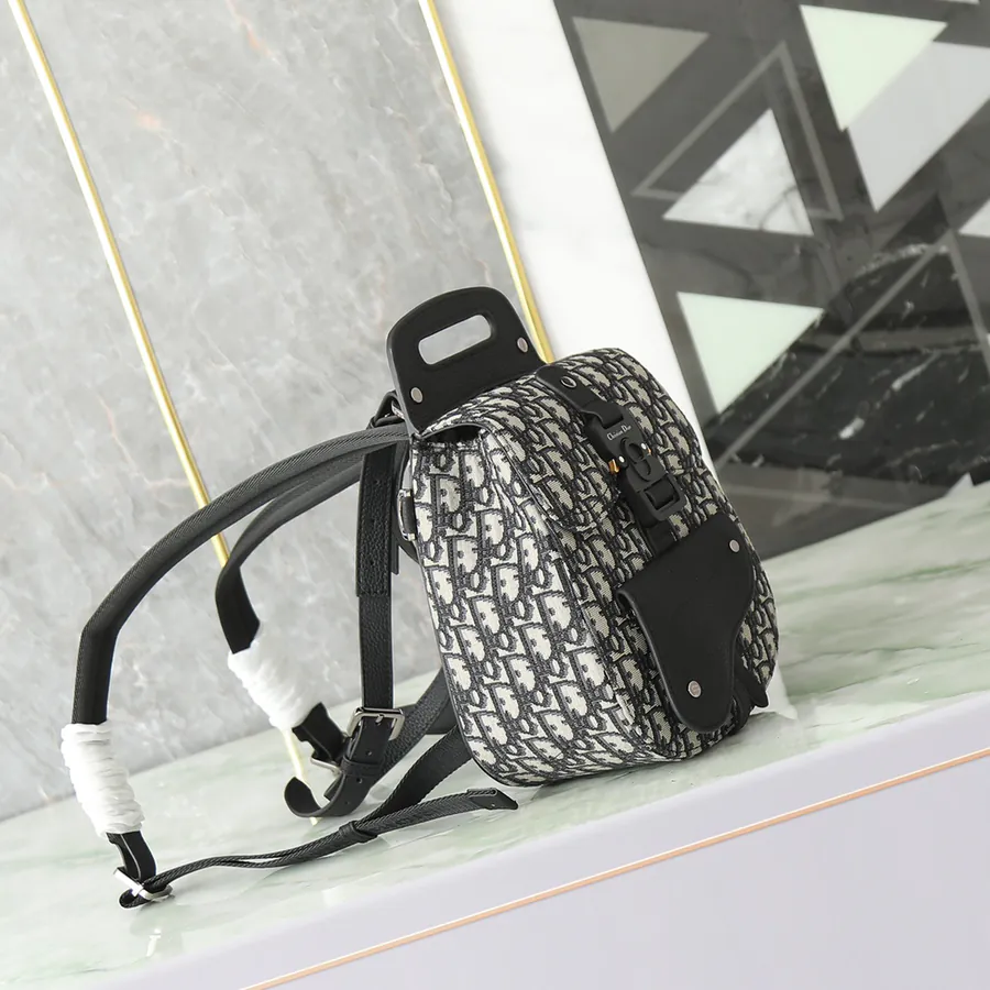 Dio Oblique Mini Backpack in Black Grained Calfskin