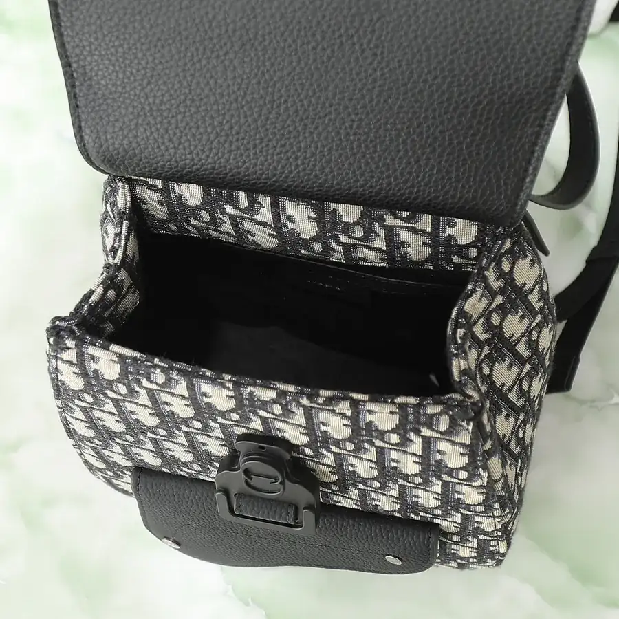 Dio Oblique Mini Backpack in Black Grained Calfskin