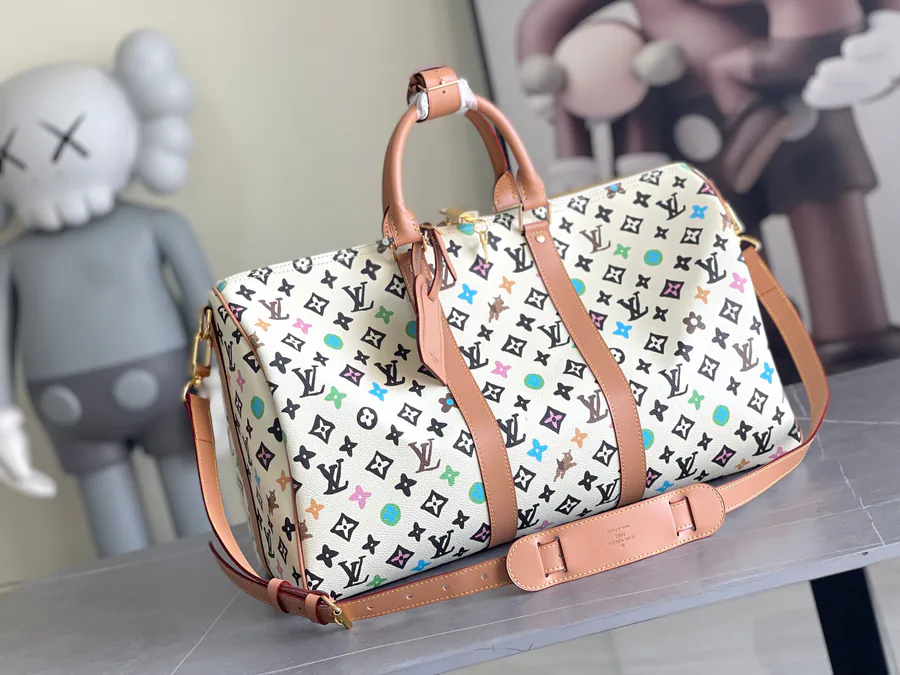 Keepall Bandoulière 45 Travel Bag in Monogram Empreinte Giant Leather