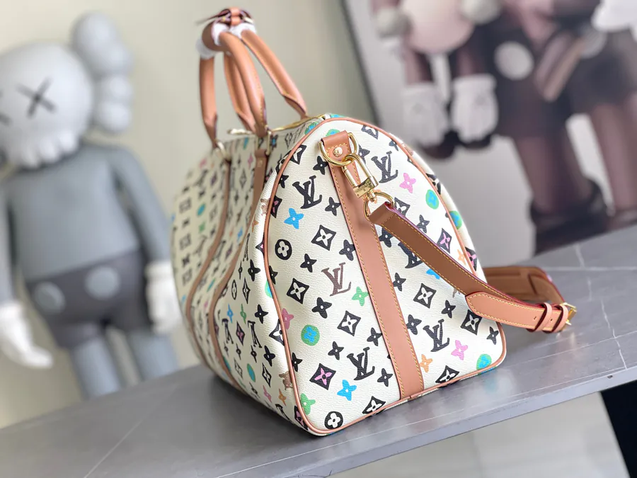 Keepall Bandoulière 45 Travel Bag in Monogram Empreinte Giant Leather