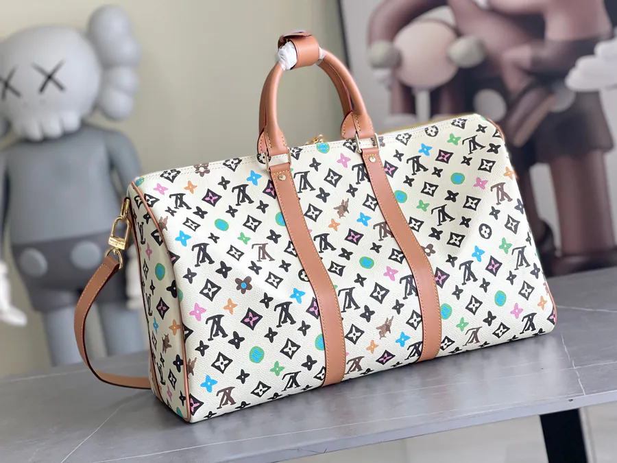 Keepall Bandoulière 45 Travel Bag in Monogram Empreinte Giant Leather