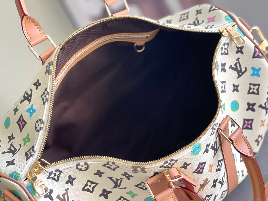 Keepall Bandoulière 45 Travel Bag in Monogram Empreinte Giant Leather