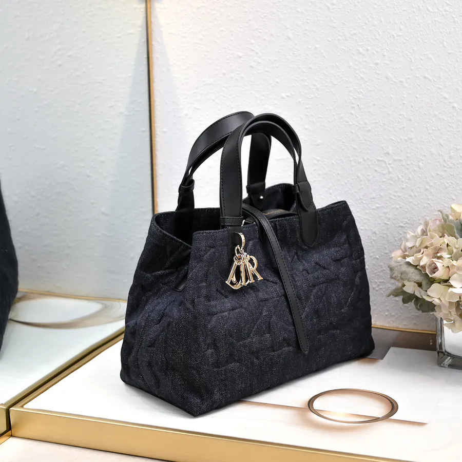 Toujours Travel Bucket Bag in Grained Calfskin