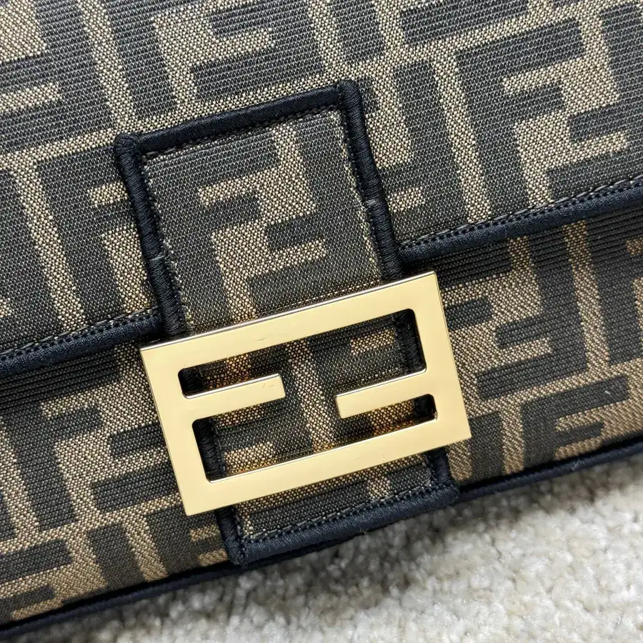 Fendi Baguette Medium Handbag with Flip Closure