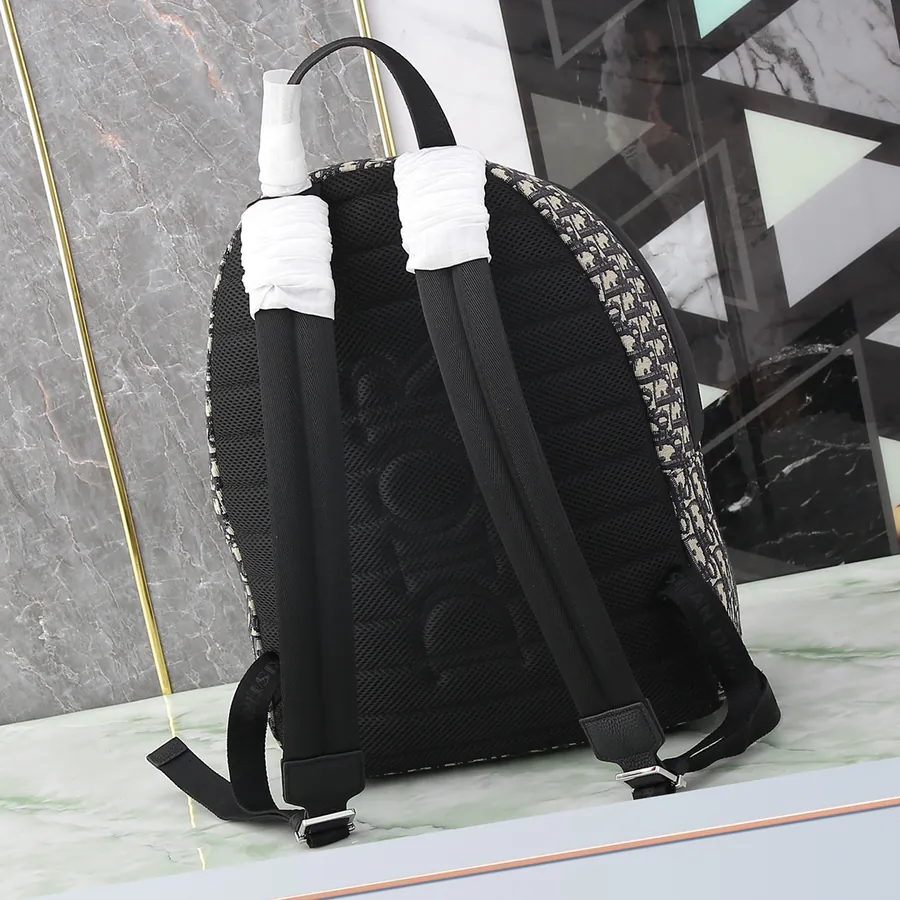 Men's OBLIQUE Backpack with Grained Calfskin Trim