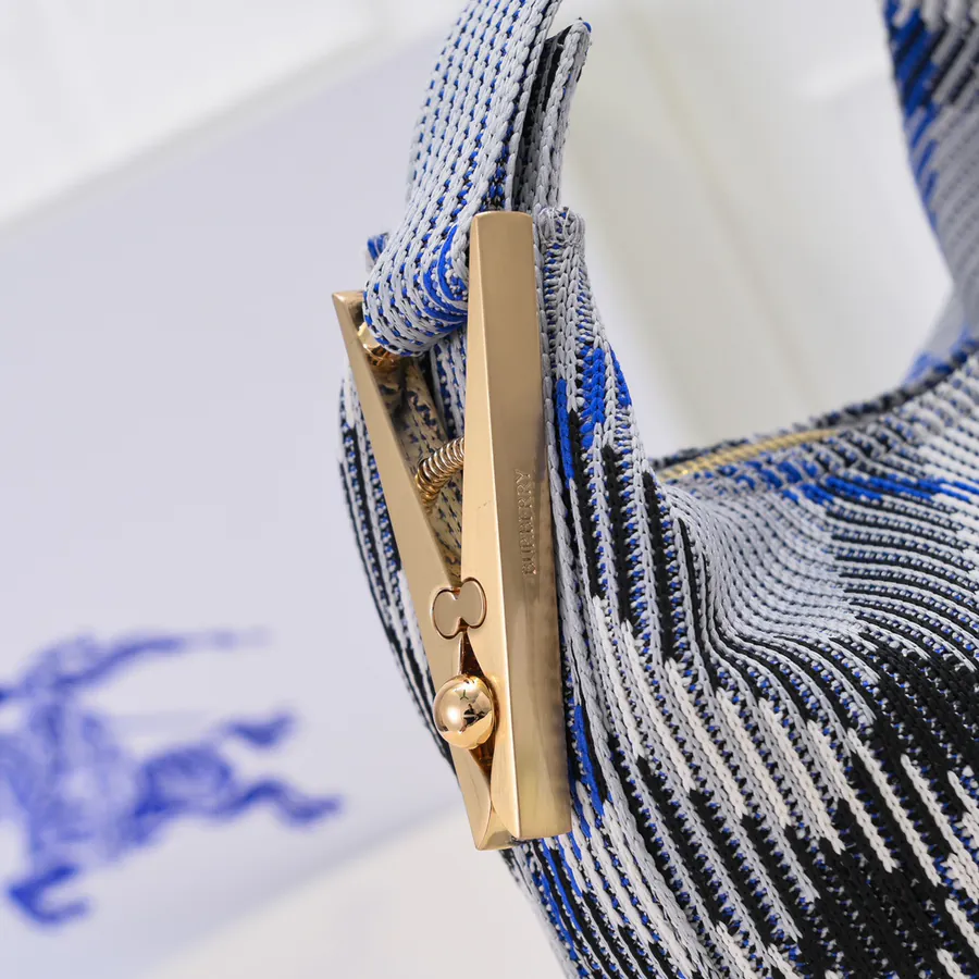 Burberry Soft Structured Clip Bag with Grained Calfskin and Tartan Trim