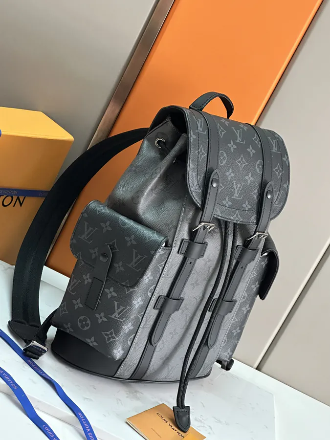 Christopher Small Backpack with Monogram Eclipse Reverse Canvas and Leather Trim