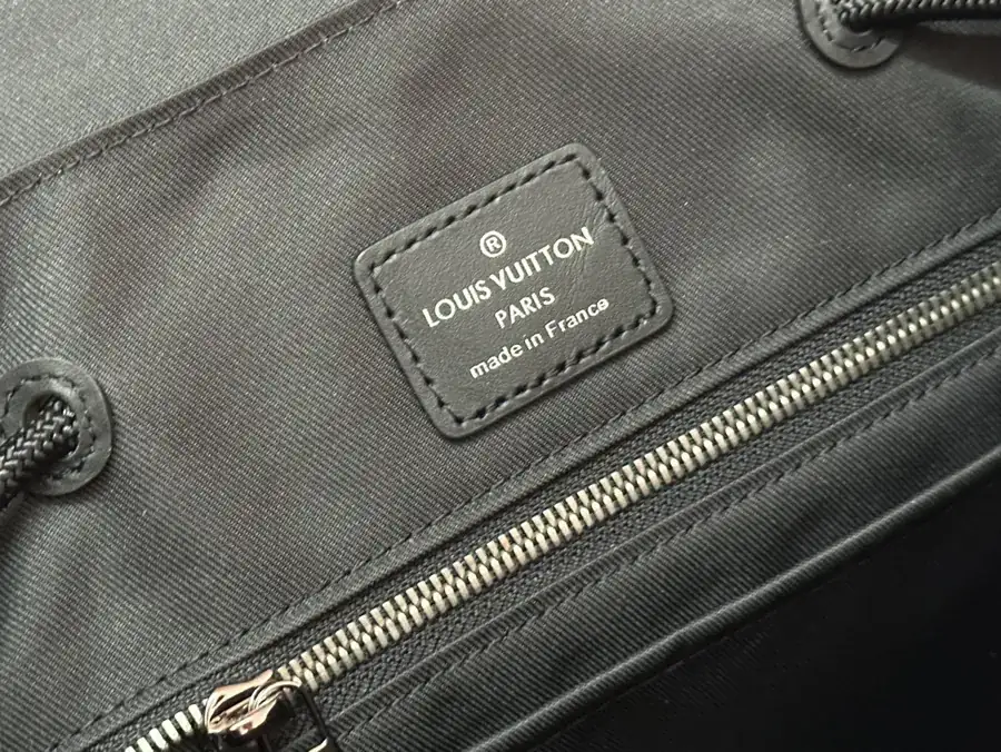 Christopher Small Backpack with Monogram Eclipse Reverse Canvas and Leather Trim