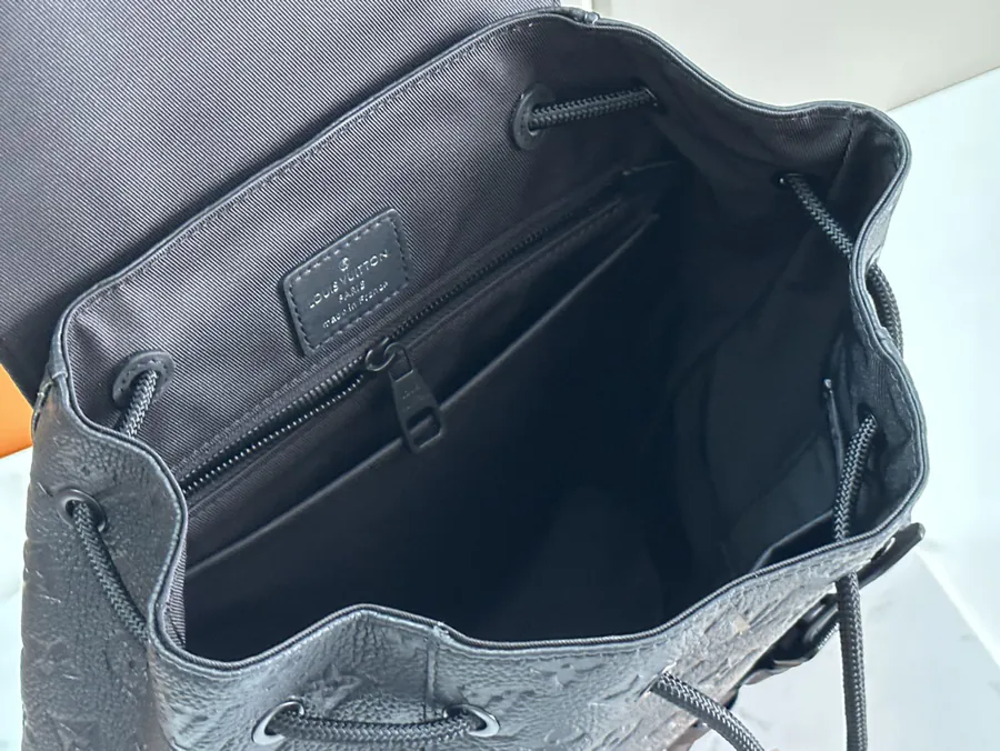 Christopher Small Backpack with Monogram Eclipse Reverse Canvas and Leather Trim