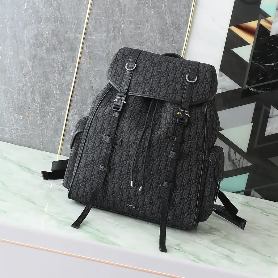 Hit The Road Flip Top Backpack Black Grained Calfskin and Oblique Print Fabric