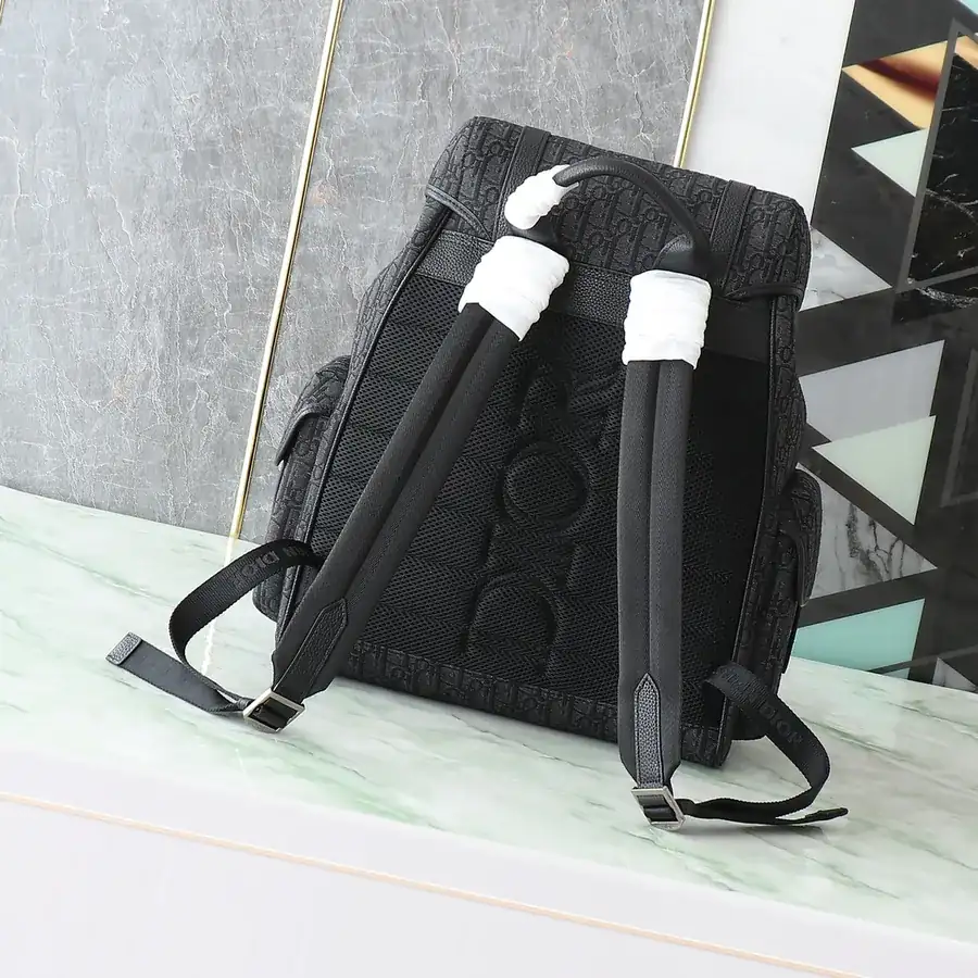Hit The Road Flip Top Backpack Black Grained Calfskin and Oblique Print Fabric