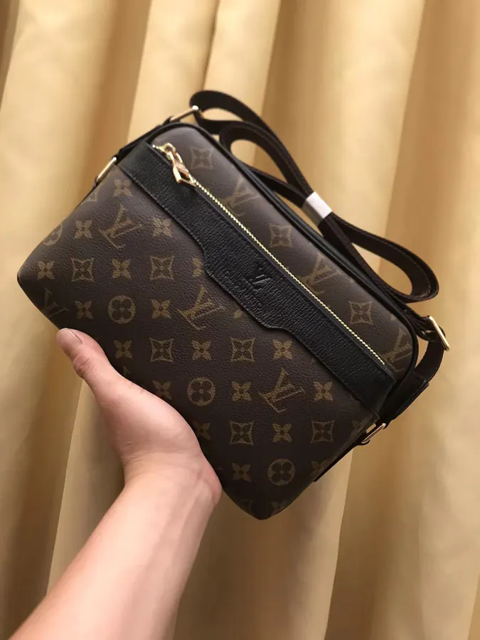 V New Arrival Bucket Bag with Logo Embossing, Classic Monogram Material, Minimalist Design
