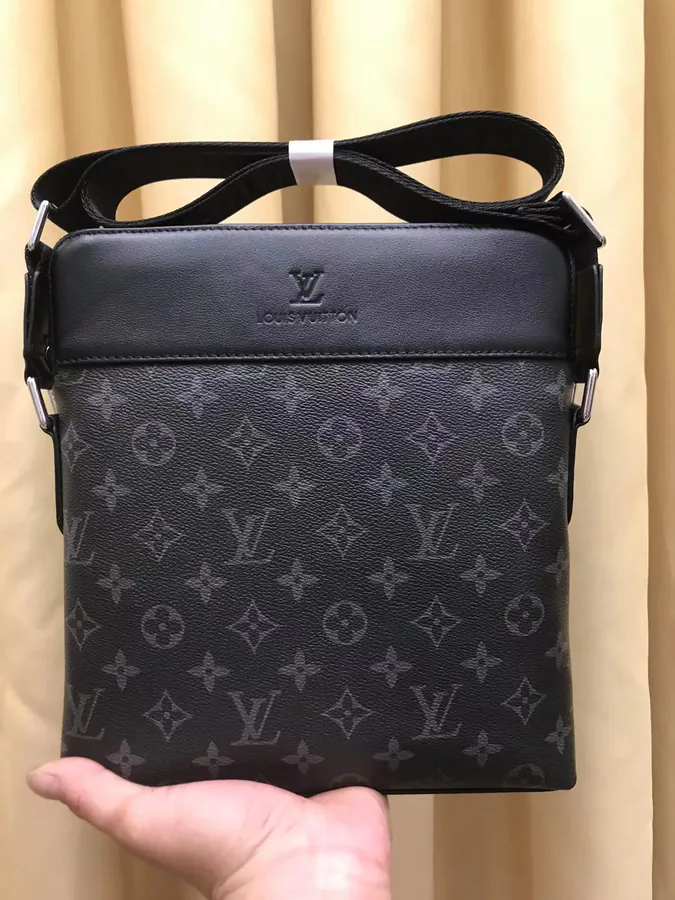 V Brand New Arrival Bucket Bag with Logo Embossing and Zippered Pockets
